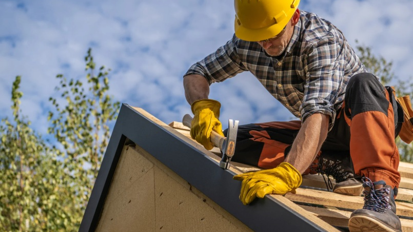 Roofing crew working on a home